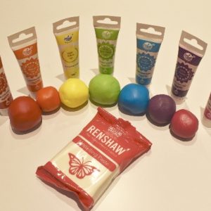 Mix Various Pro Gel colours to make rainbow colours into 20g balls of Renshaw modelling paste.