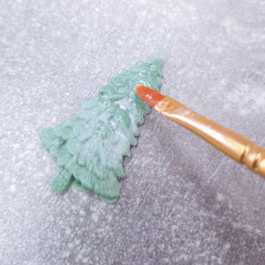 Cut and add shimmer to delicate trees